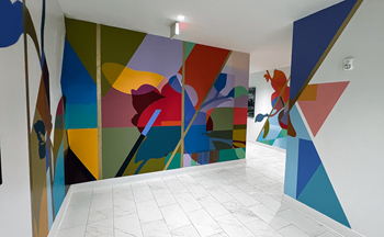 A mural on the wall of a corridor
